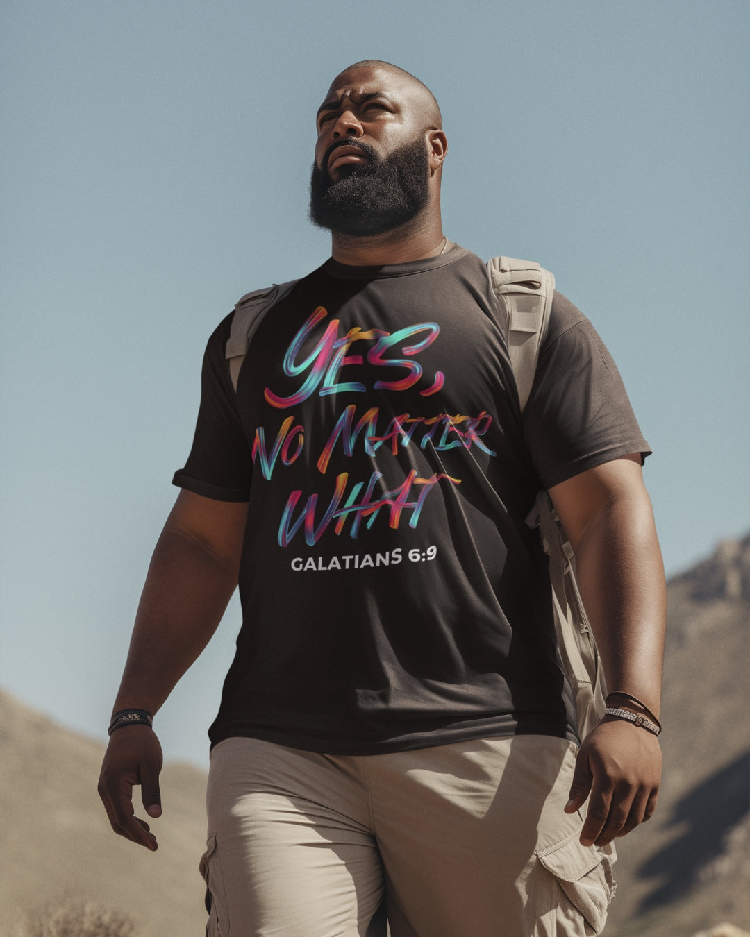 Yes, No Matter What - Black T-Shirt - Man - Hiking - with backpack strap - Nude pants - Standing - Forest